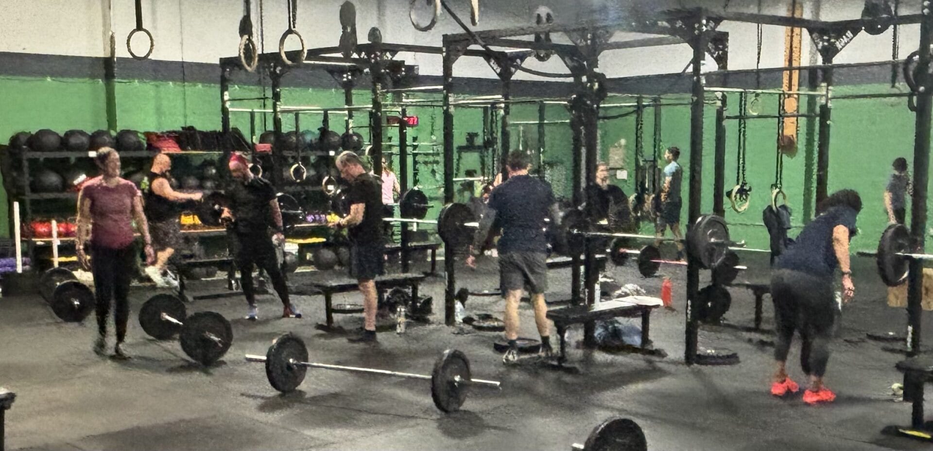 Group Class working out with barbells